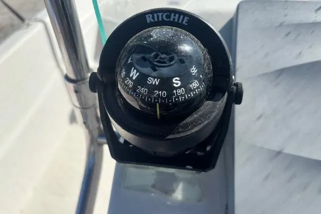 Slide: The Image of Ritchie compass on 2015 Carolina Skiff 198 DLV boat dashboard. - 19