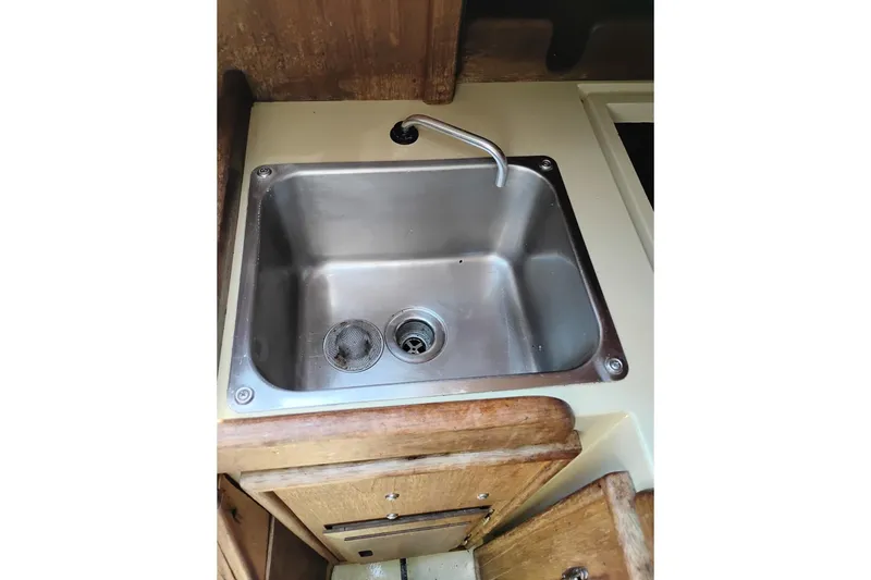 Slide: The Image of Stainless steel sink in 1982 Ericson 25 boat galley. - 14