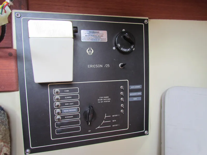 Slide: The Image of Control panel of a 1982 Ericson 25 sailboat with switches and dials. - 20