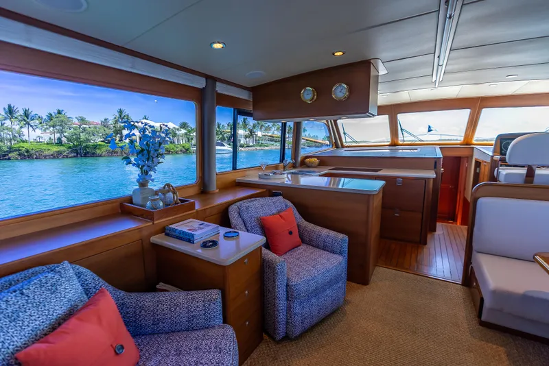 Slide: The Image of Luxurious interior of 2018 Grand Banks GB60 yacht with scenic water views. - 28