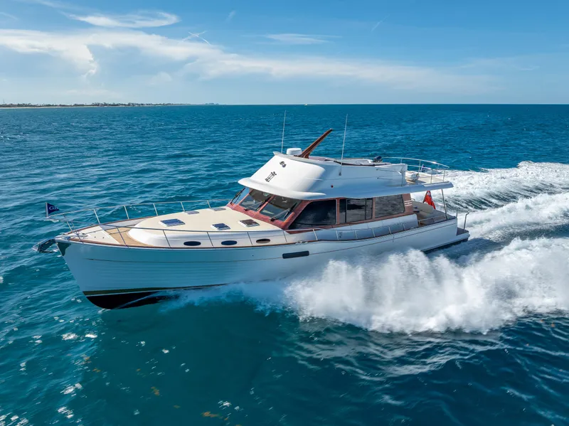 Slide: The Image of 2018 Grand Banks GB60 yacht cruising on open sea. - 88