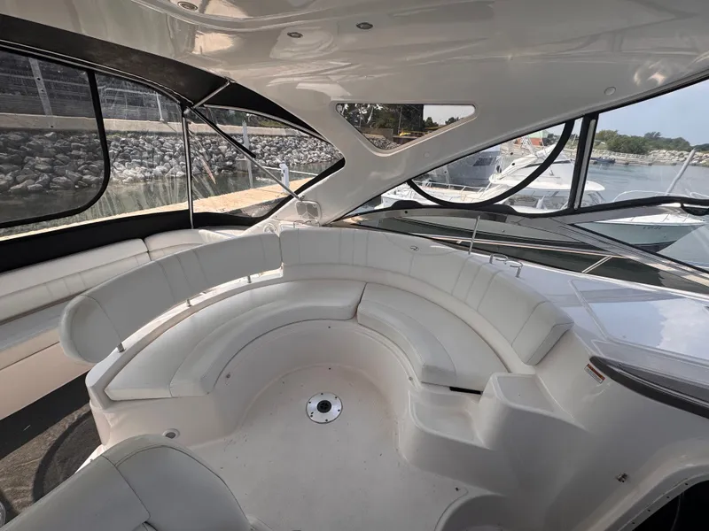 Slide: The Image of The image shows the cockpit of a 2006 Regal Commodore 3860 with white seating and large windows. - 4