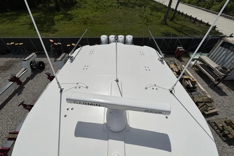 Slide: The Image of Top view of a 2023 Regulator 41 boat with Garmin radar equipment. - 53