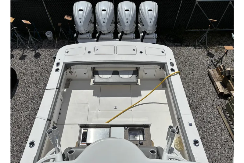 Slide: The Image of 2023 Regulator 41 boat deck with four powerful V8 engines, spacious layout. - 56