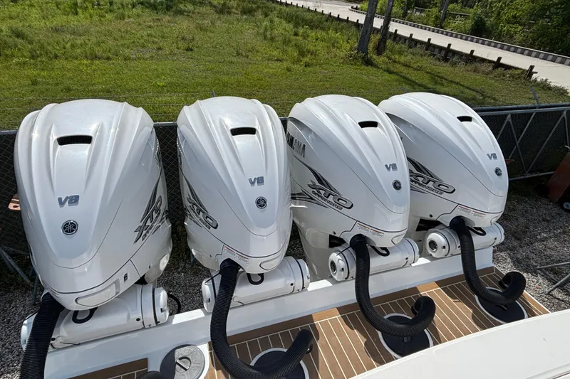 Slide: The Image of Four Yamaha V8 outboard engines on a 2023 Regulator 41 boat. - 68