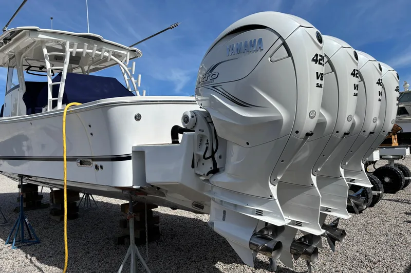 Slide: The Image of 2023 Regulator 41 boat with Yamaha 425 V8 engines, displayed on stands. - 70