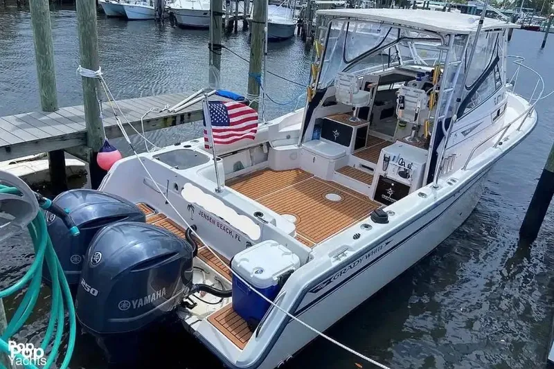 Slide: The Image of Aerial view of 1995 Grady-White Marlin 300 boat on water. - 2