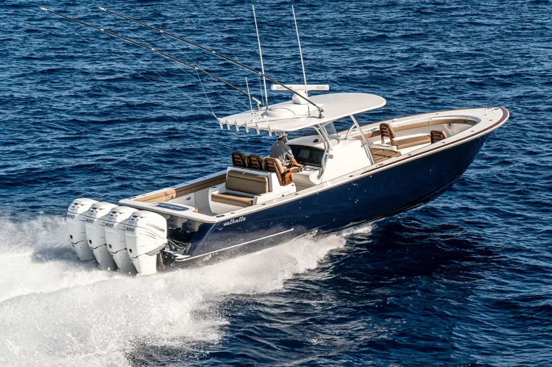 The Image of 2026 Valhalla Boatworks V-41 cruising on open ocean with four powerful engines. - 0
