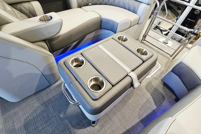 Slide: The Image of Luxurious interior of 2024 Bennington RX 23 RXFBA boat with cup holders and seating. - 16