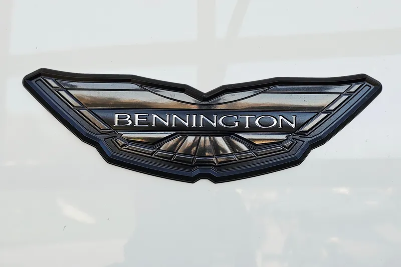Slide: The Image of 2024 Bennington RX 23 RXFBA logo on a sleek, metallic background. - 22
