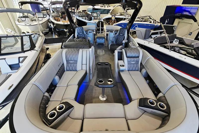 Slide: The Image of Luxurious 2024 Bennington RX 23 RXFBA pontoon boat interior with plush seating and modern amenities. - 6