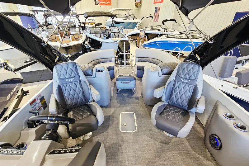 Slide: The Image of Luxurious interior of 2024 Bennington RX 23 RXFBA pontoon boat in showroom. - 7
