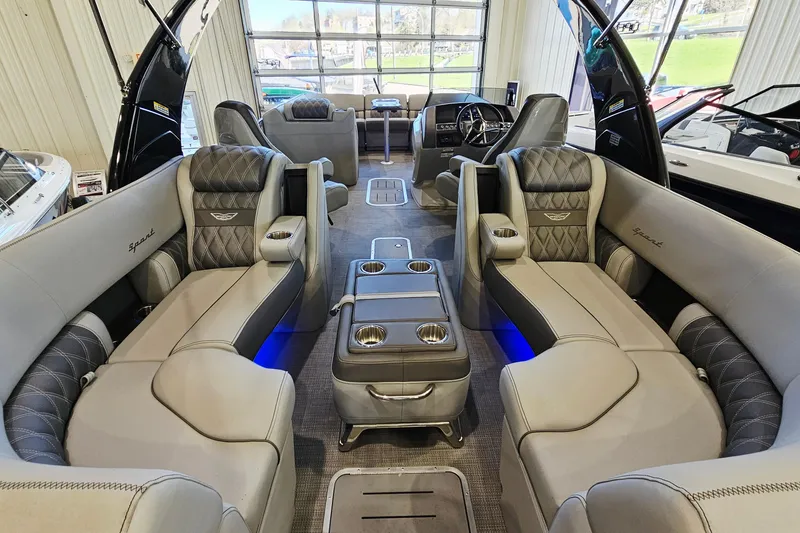 Slide: The Image of Luxurious interior of 2024 Bennington RX 23 RXFBA pontoon boat with plush seating and modern design. - 9