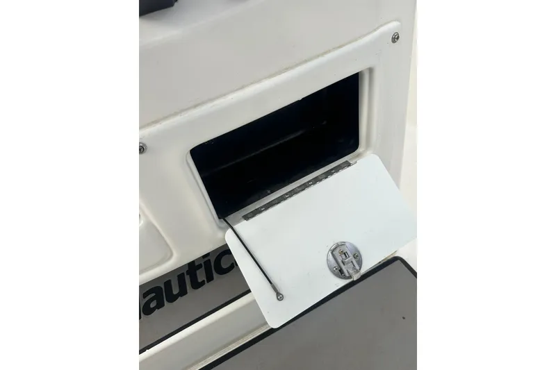 Slide: The Image of 2023 NAUTIC STAR 22 L boat compartment with open hatch and latch. - 41