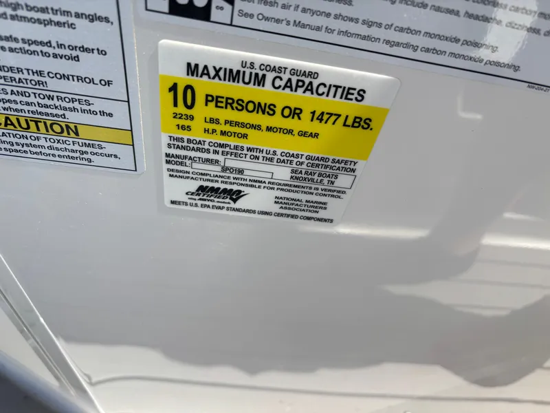 Slide: The Image of US Coast Guard capacity label on Sea Ray SPX 190 boat. - 10