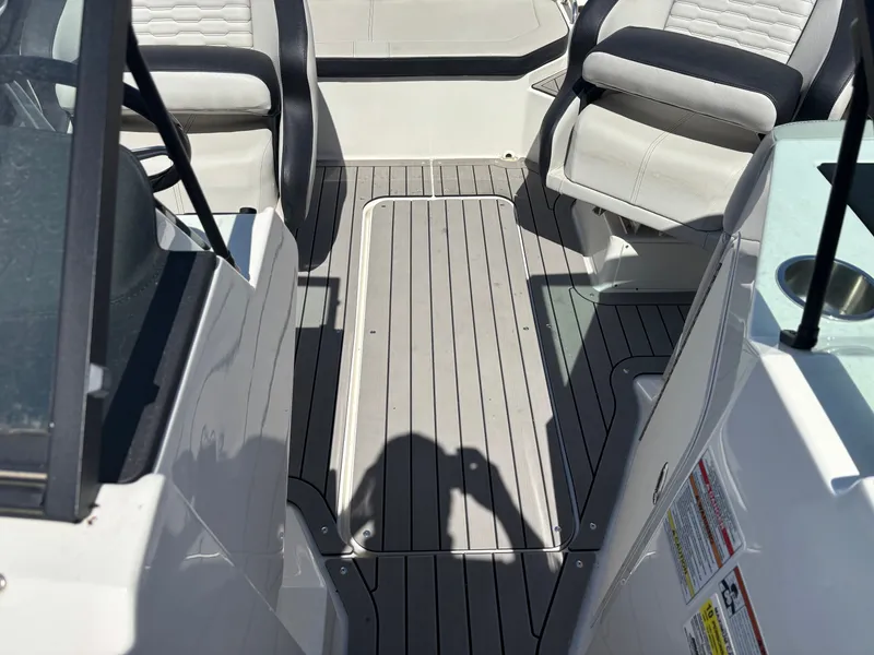 Slide: The Image of Interior of a 2022 Sea Ray SPX 190 boat with seating. - 11