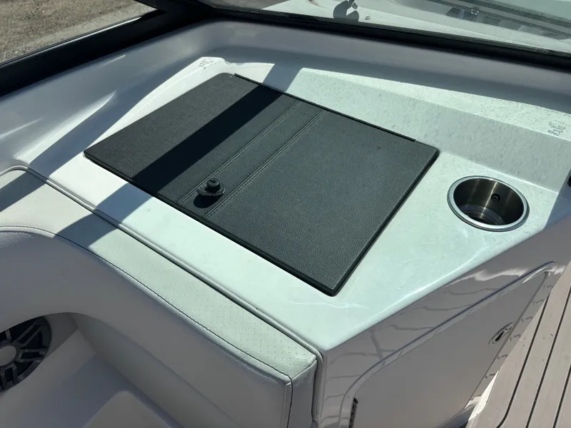 Slide: The Image of Interior of 2022 Sea Ray SPX 190 with cup holder. - 9