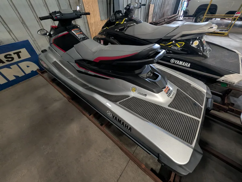 Slide: The Image of 2017 Yamaha EX1050A-SB jet ski in a storage facility. - 4