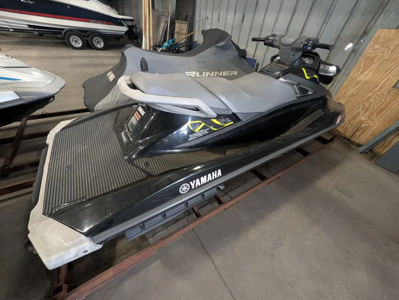 Slide: The Image of 2015 Yamaha VX1100B-PB jet ski in storage facility. - 6