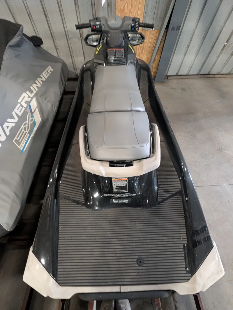 Slide: The Image of 2015 Yamaha VX1100B-PB jet ski in a garage. - 7