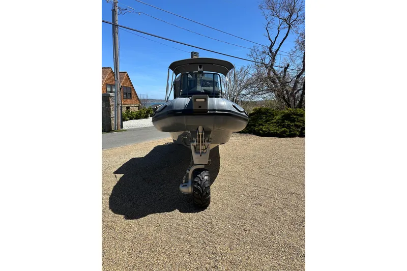 Slide: The Image of 2018 Sealegs 7.7 Amphibious RIB on land, showcasing its unique amphibious capabilities. - 5