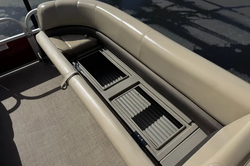 Slide: The Image of 2023 Sun Tracker Party Barge 18 DLX seating with under-seat storage compartments. - 14