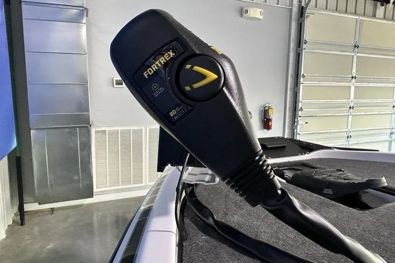 Slide: The Image of Close-up of Fortrex trolling motor on 2026 Skeeter ZX150 boat in a garage. - 16