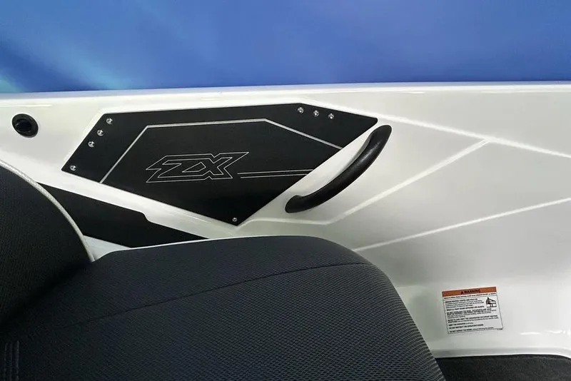 Slide: The Image of Interior view of 2026 Skeeter ZX150 boat with ZX logo and seating. - 20