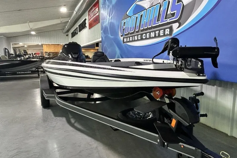 Slide: The Image of 2026 Skeeter ZX150 boat displayed at Foothills Marine Center showroom. - 3