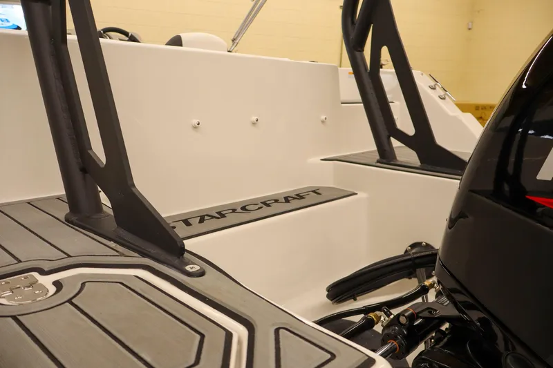 Slide: The Image of 2026 Starcraft SVX 191 OB boat interior with modern design and engine details. - 10