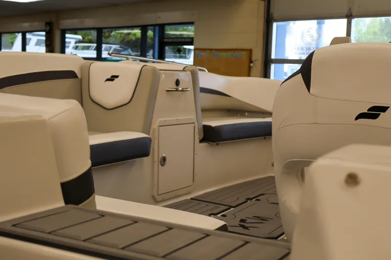 Slide: The Image of Interior view of 2026 Starcraft SVX 191 OB boat, featuring sleek seating and modern design. - 5