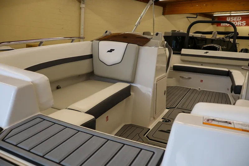 Slide: The Image of 2026 Starcraft SVX 191 OB boat interior with sleek seating and modern design. - 8