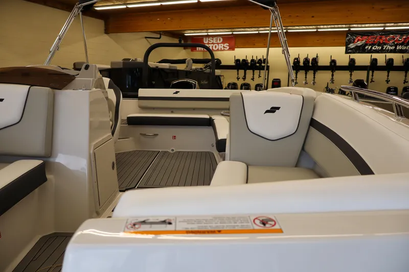 Slide: The Image of 2026 Starcraft SVX 191 OB boat interior with sleek seating and modern design. - 9