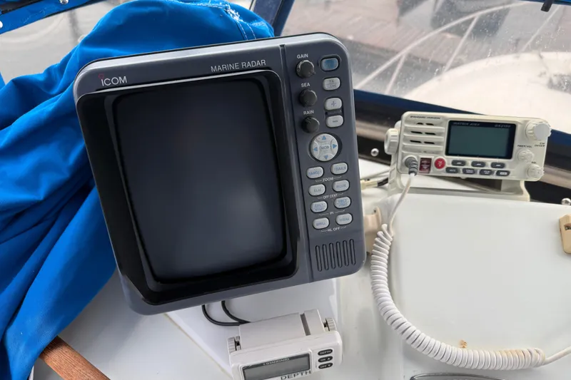 Slide: The Image of Marine radar and radio equipment on a 1979 Uniflite 37 Coastal Cruiser boat. - 13