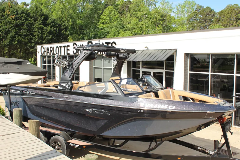 The Image of 2022 Tigé 23ZX boat displayed at Charlotte Ski Boats dealership. - 1