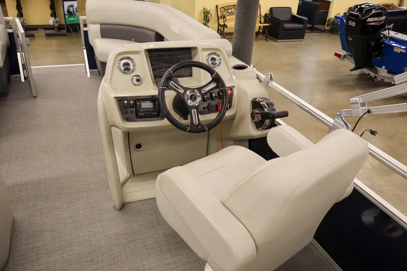 Slide: The Image of Interior view of 2025 SunChaser Vista 18 Fish boat, featuring a modern helm and seating. - 8