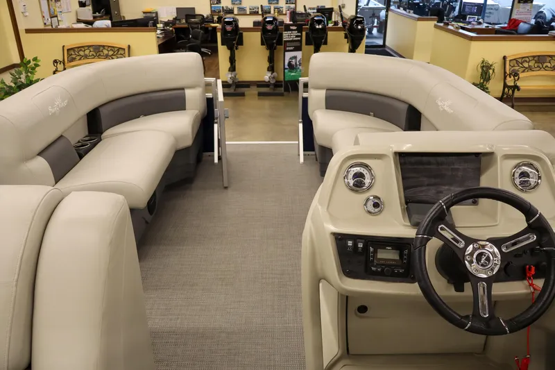Slide: The Image of Interior view of 2025 SunChaser Vista 18 Fish pontoon boat with modern helm and seating. - 9
