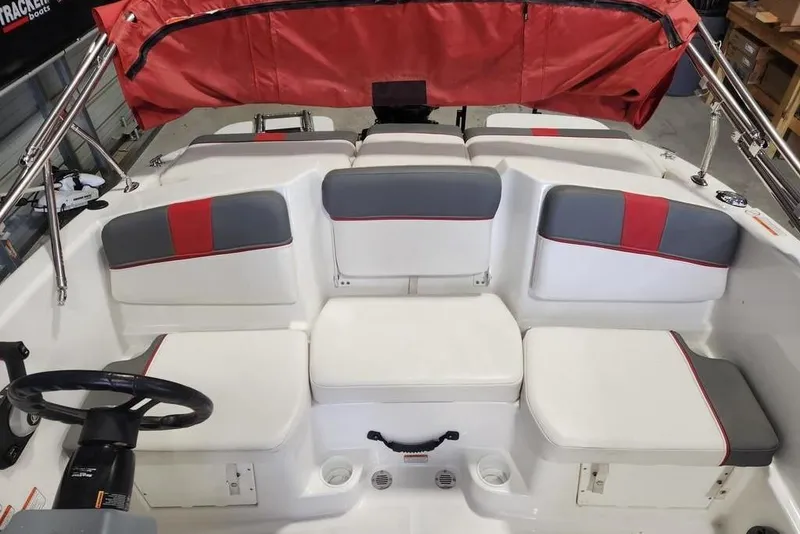 Slide: The Image of Interior of a 2022 Tahoe T16 boat with red and gray seating. - 4