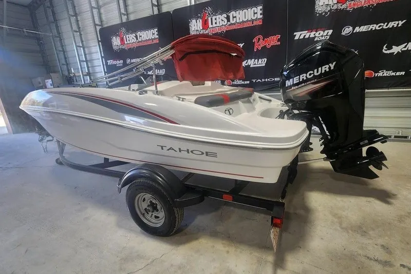 Slide: The Image of 2022 Tahoe T16 boat with Mercury engine on trailer in showroom. - 5
