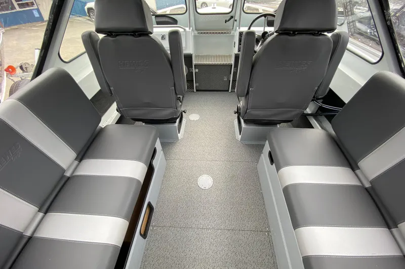 Slide: The Image of Interior of 2026 Hewescraft 190 Sea Runner with gray seating. - 10
