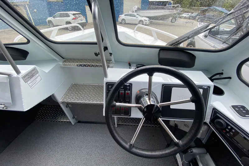 Slide: The Image of Interior view of 2026 Hewescraft 190 Sea Runner cockpit. - 14