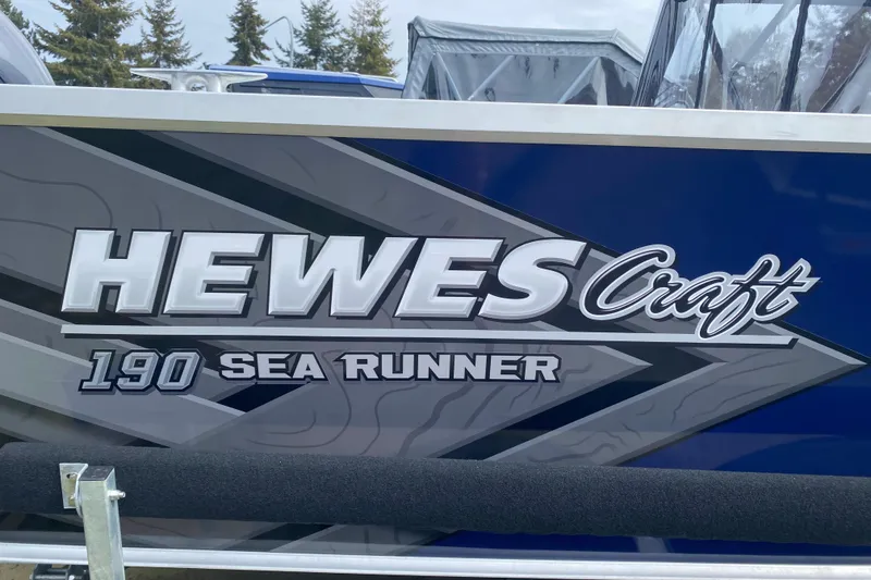 Slide: The Image of Hewescraft 190 Sea Runner boat, 2026 model, side view. - 3