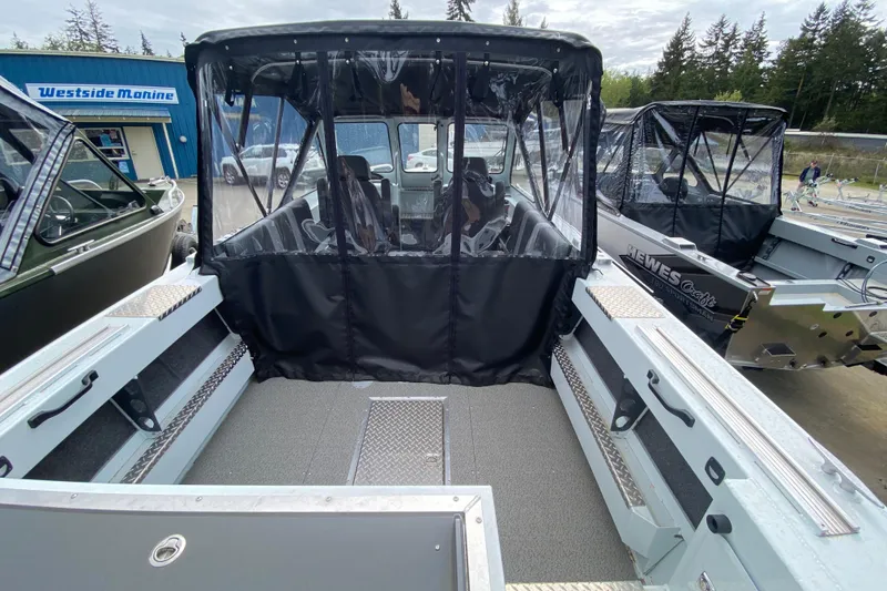 Slide: The Image of 2026 Hewescraft 190 Sea Runner boat outdoors at Westside Marine. - 4