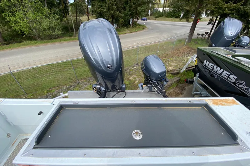 Slide: The Image of Hewescraft 190 Sea Runner 2026 with outboard motors on trailer. - 6