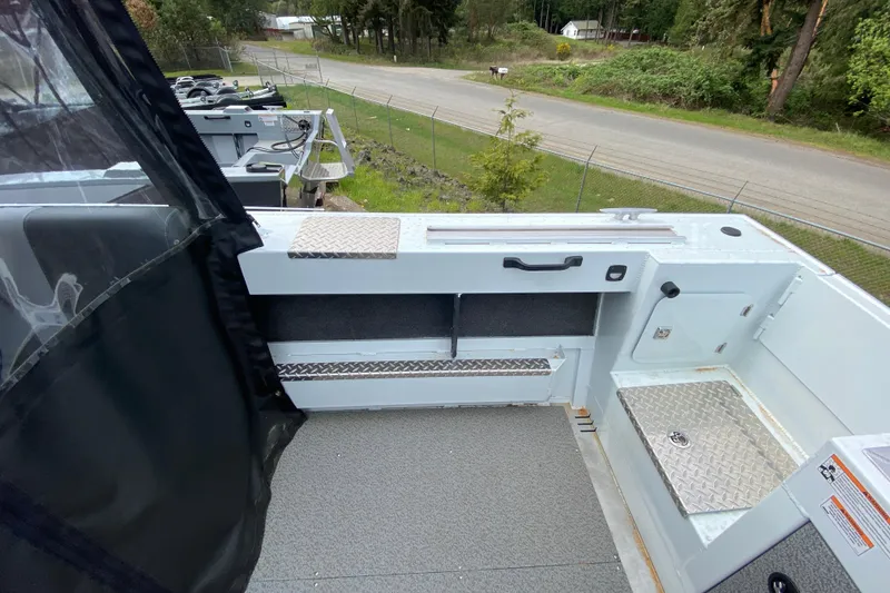 Slide: The Image of Interior view of the 2026 Hewescraft 190 Sea Runner boat. - 7