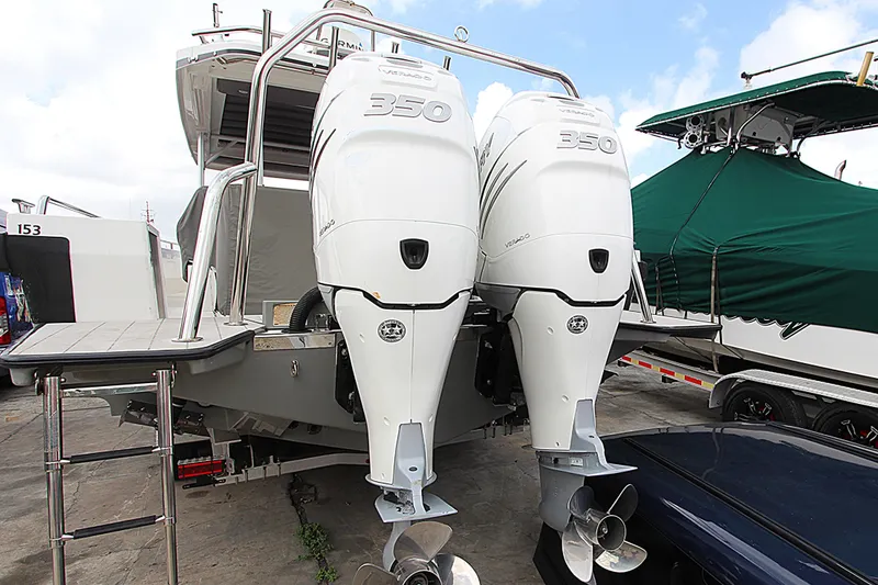 Slide: The Image of 2018 Axopar 37 Sun-Top with twin 350 horsepower outboard engines. - 14