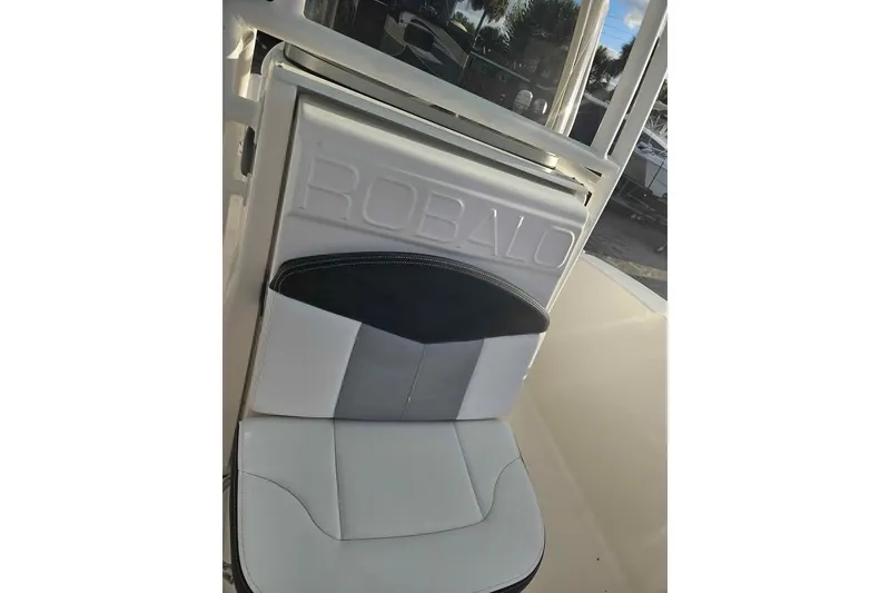 Slide: The Image of 2021 Robalo R202 Explorer boat seat with embossed logo detail. - 8