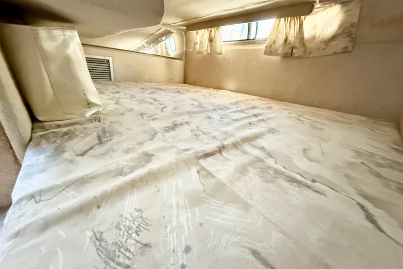 Slide: The Image of Stereo system inside a 1998 Rinker Fiesta Vee 280 boat cabin. - 16