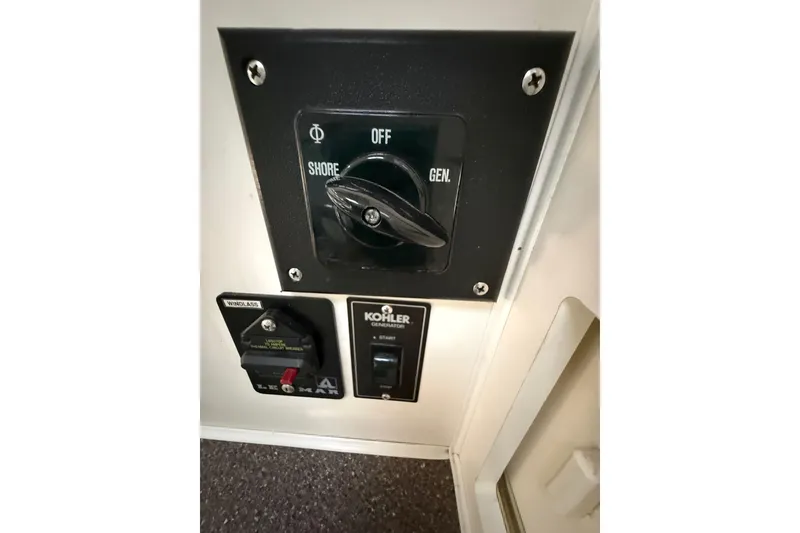 Slide: The Image of Marine air system control panel in 1998 Rinker Fiesta Vee 280 cabin. - 23