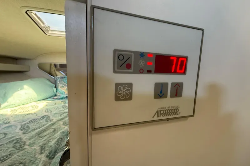 Slide: The Image of Black bag containing a Magma grill on a Rinker Fiesta Vee 280 boat. - 24